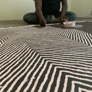 Portrait of Warlimpirrnga Tjapaltjarri