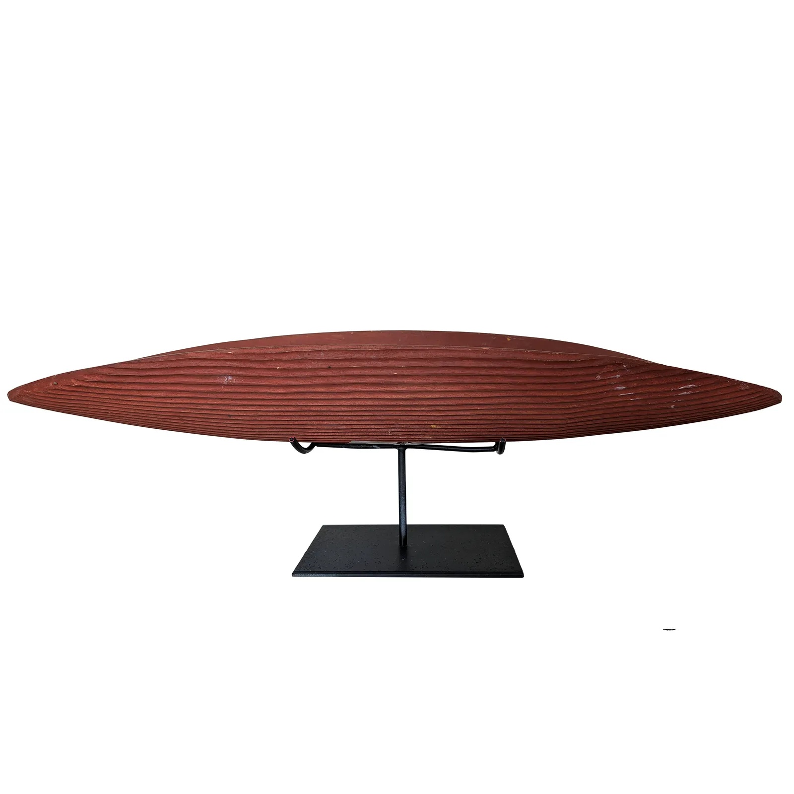 Artist Once Known, Coolamon with Ochre, c.1980, natural earth pigments on carved wood, 70 x 24 cm