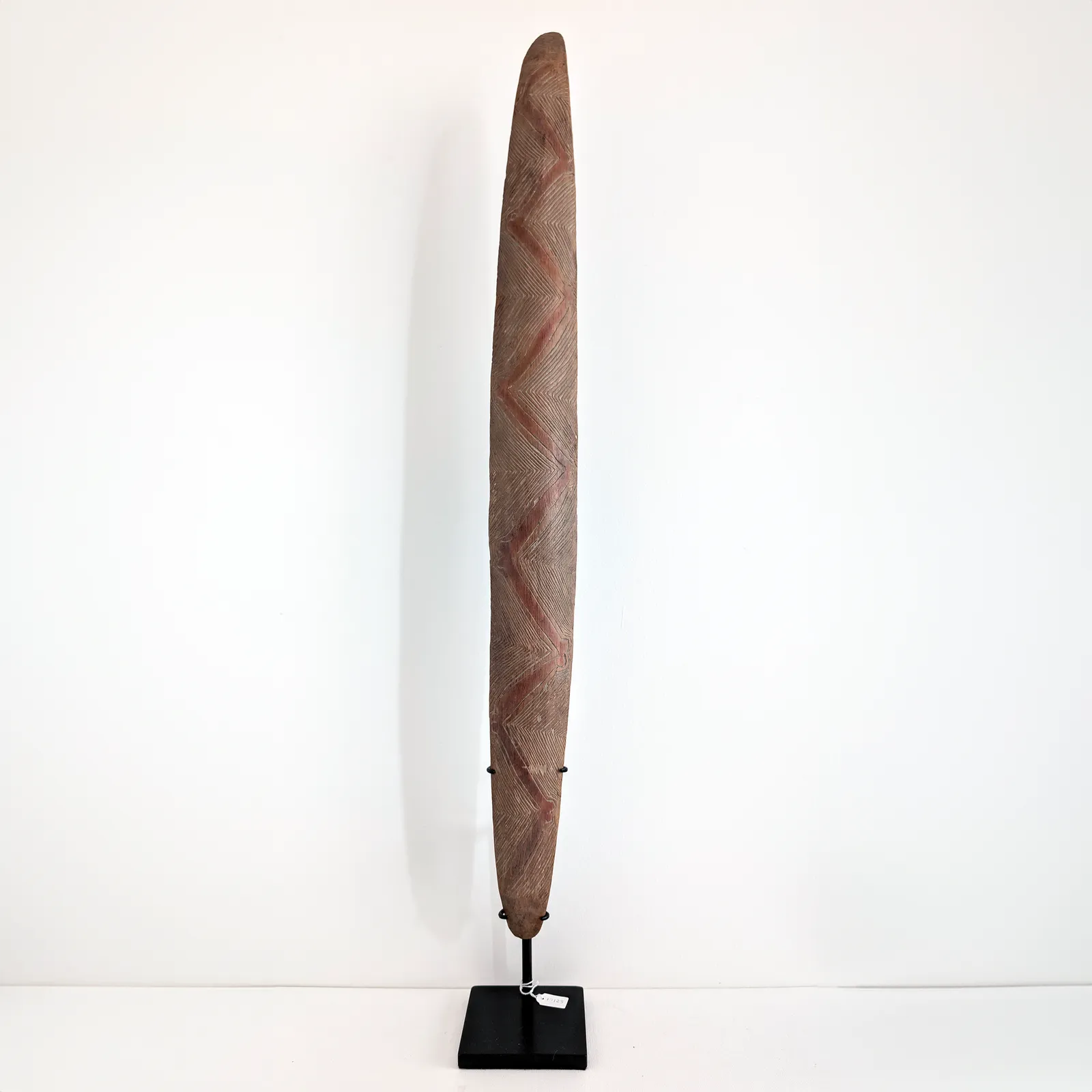 Artist Once Known, Aboriginal Parrying Shield, c.1940s, incised wood, 83 x 8 cm