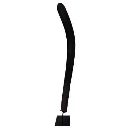 Artist Once Known, A Central Desert Hardwood Killing Boomerang, c.1980, carved wood, 74 cm