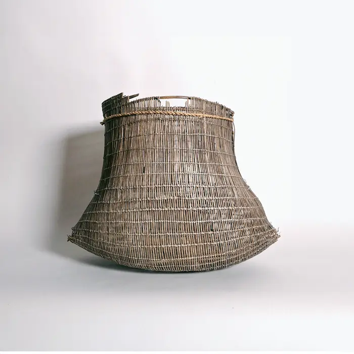 Artist Once Known, Fine Early Bicornual Basket (Jawun), Early 1900s, woven split lawyer cane, 23 x 30 x 17 cm