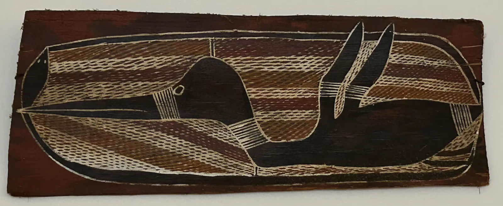 Artist Once Known, Diver Duck c Worm, natural earth pigments on bark, 40 x 15 cm