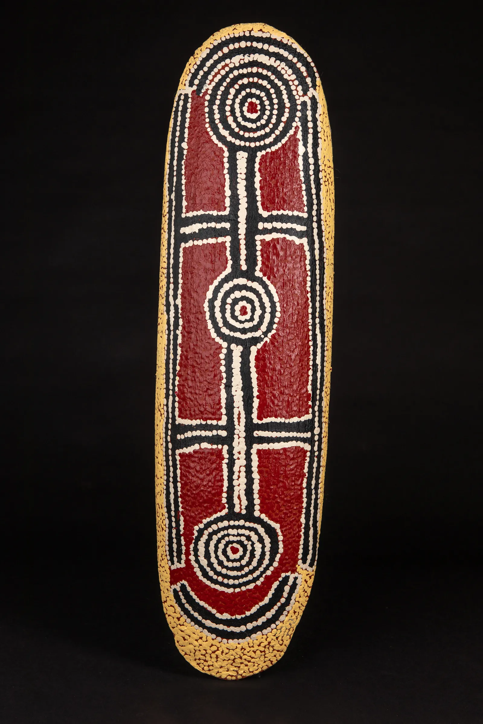 Paddy Japaljarri Stewart, Honey Ant Dreaming, 2010, synthetic polymer paint on carved wood, 79 cm