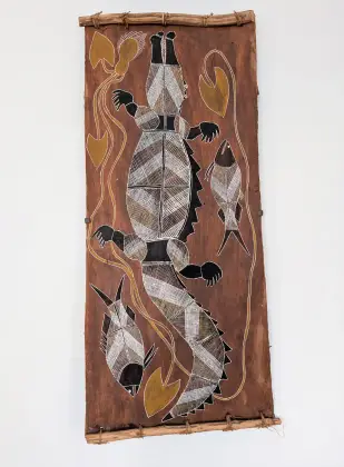 Bobby Nganjmirra, Saltwater Crocodile in Freshwater, c.1990, natural earth pigments on stringy bark, 100.5 x 46.5 cm
