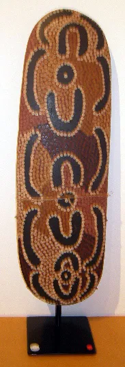 George Tjampu Tjapaltjarri, Ceremonial Dance Board, synthetic polymer paint on wood, 43 m
