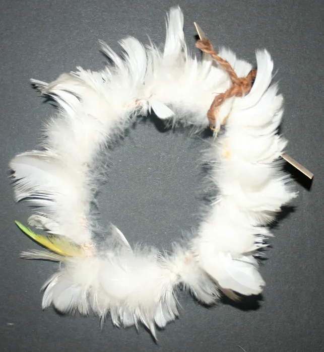 Guwaykuway Wanambi, Armband, feather and string, 18 cm dia