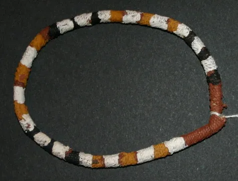 Lena Yarinkura, armband, natural earth pigments and string, 10 cm dia