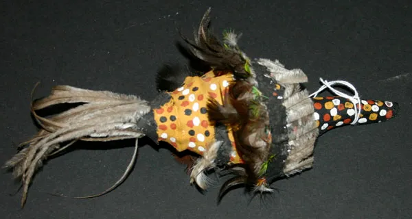 Artist Once Known, ceremonial object, shell, feathers, ochre, resin, 28 x 8 x 8 cm