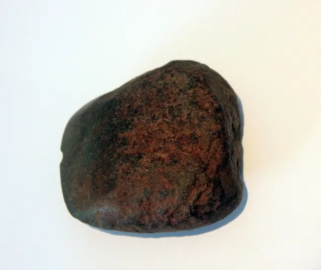 Artist Once Known, Early Stone Hand Axe, stone, 8 x 8 x 3 cm