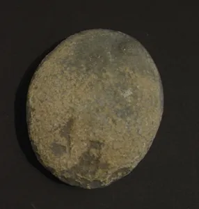 Artist Once Known, Early Grinding Stone, stone, 19 x 15 x 4 cm