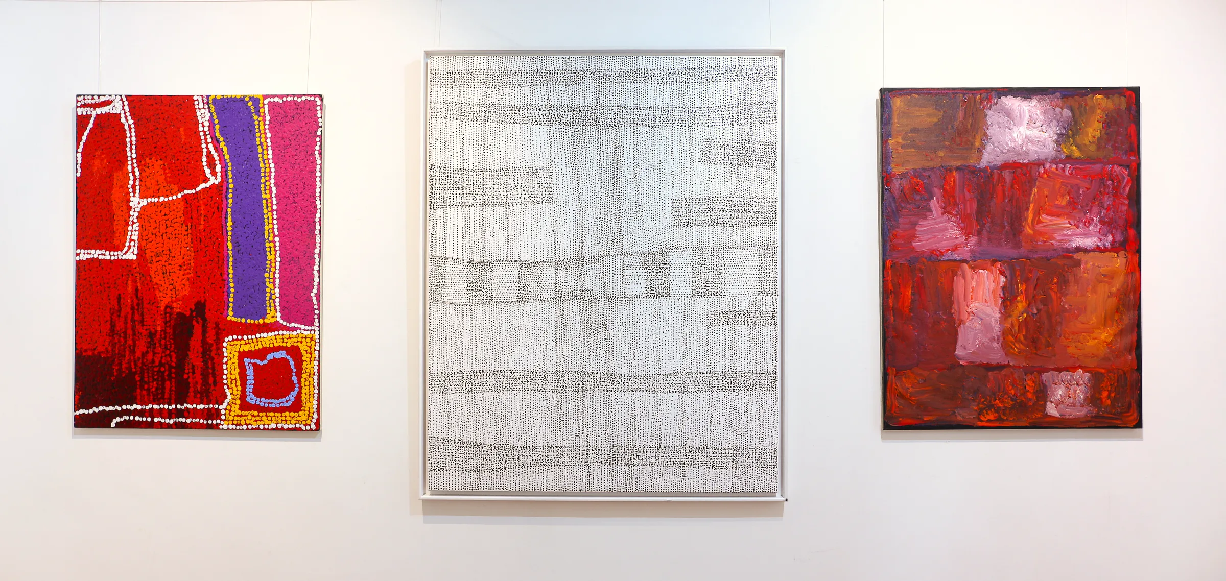 Three paintings from the Cipa collection hanging at Newstead Art.